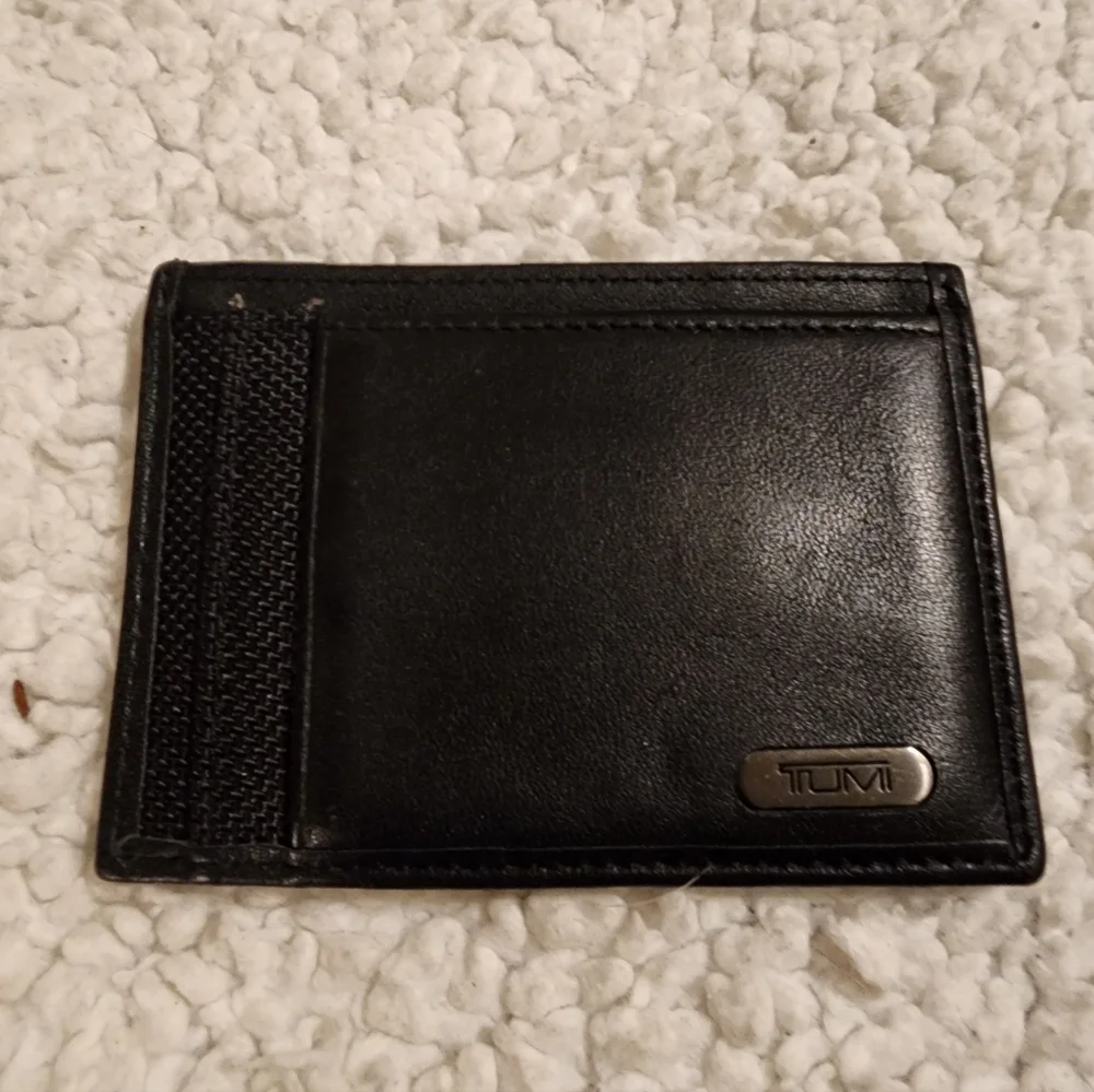 TUMI Black Leather Money Clip with Silver Accent